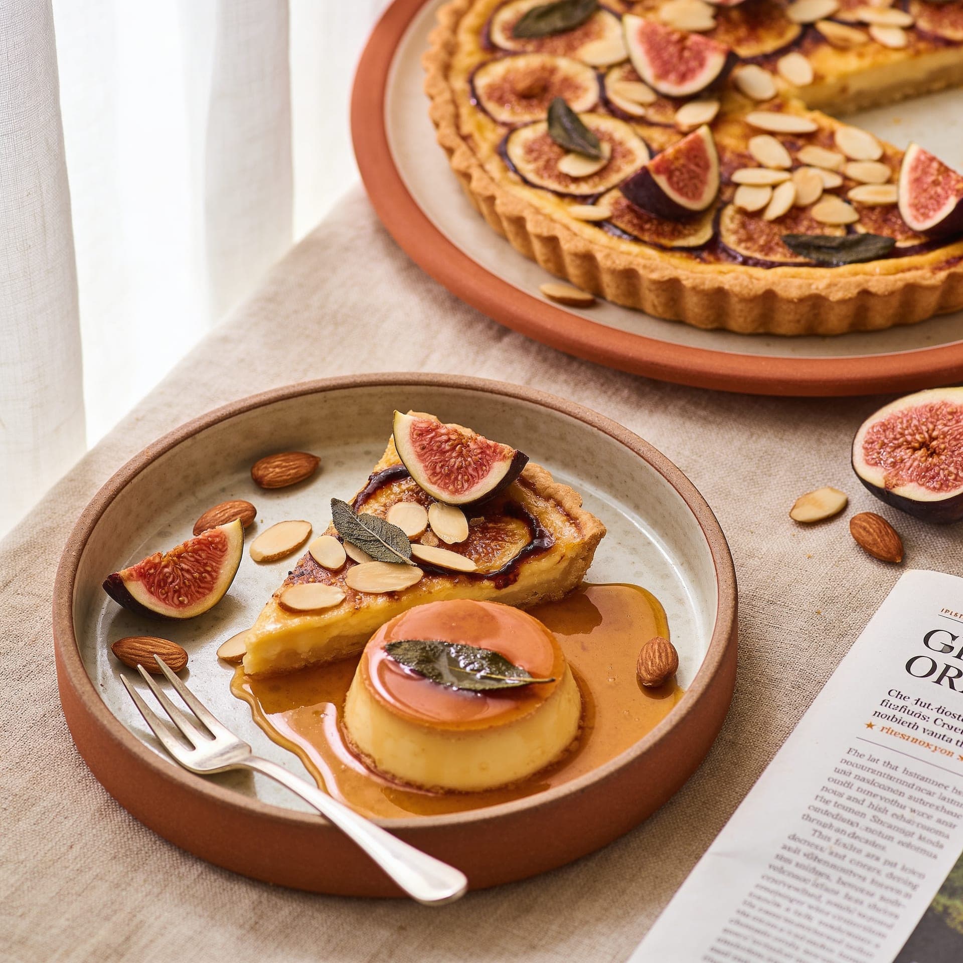An almond tart with burnt honey and a fig leaf custard, served warm